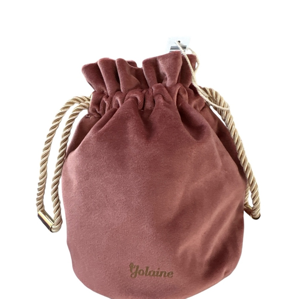 Velvet gift pouch. Very good quality. Inside is cotton.